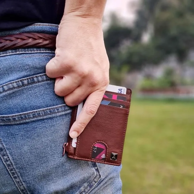 cardholder leather stretched out cards falling