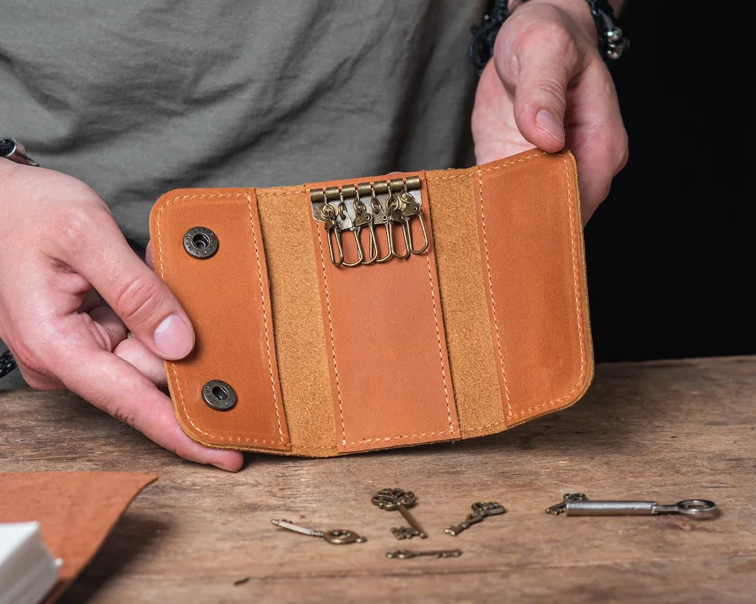 key pouch scratching inside of leather bag